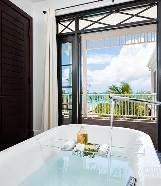 Located in a lush tropical garden, Saving Grace is a lovely 5000+ square foot, two story, L shaped Colonial Style Turks and Caicos villa. Exquisite and understated elegance are the signatures of this warm and soulful Turks and Caicos vacation home. Nestled discreetly into a private sunset-facing cove on one of the top beaches in the world, the use...