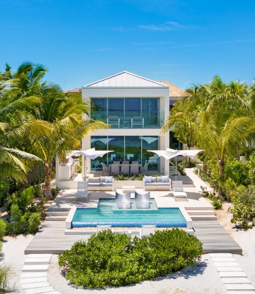 Located on the tranquil shores of Grace Bay, Seascape epitomizes luxury island lifestyle. This chique 5-bedroom, 5-bathroom villa offers world class amenities with unobstructed oceanfront views. The villa features striking modern design both indoors and out with expansive living space totaling more than 5,500 square feet. Guests of Seascape enjoy...