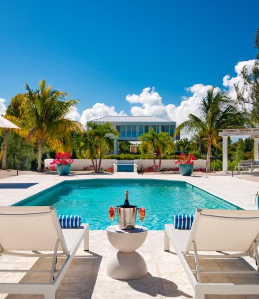 Seagrace Villa is nestled on the canal in the gated community of Leeward, just moments away from Salt Bar and Grill. This spectacular villa comes with everything you need for the perfect island vacation. The villa stocks beach chairs, coolers, & beach umbrellas for your day trips to Grace Bay Beach, just 5 minutes away. Guests are also invited...