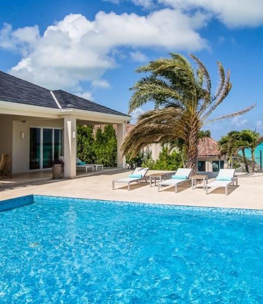 Step into Villa Capri in Providenciales on the Turks and Caicos Islands and you'll be instantly swept off your feet with the impossible colors of Chalk Sound. Go ahead dip your toes, you'll never want to leave! Soak in the sun at this premiere ultra modern luxury waterfront villa located on Chalk Sound on the island of Providenciales, where...