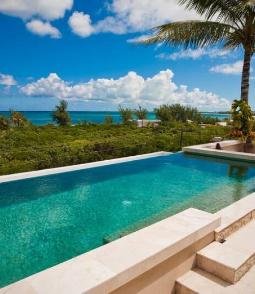 Turtle Ridge Villa is a magnificient villa on the Island of Povidenciales. This villa is home to stunning views of Grace Bay's turquoise waters and natural beauty of Turks and Caicos. At Turtle Bay Villa you can enjoy Caribvean meals made in the gourmet kitchen. You'll be able to relax at the property's wet bar and enjoy your favorite music with...