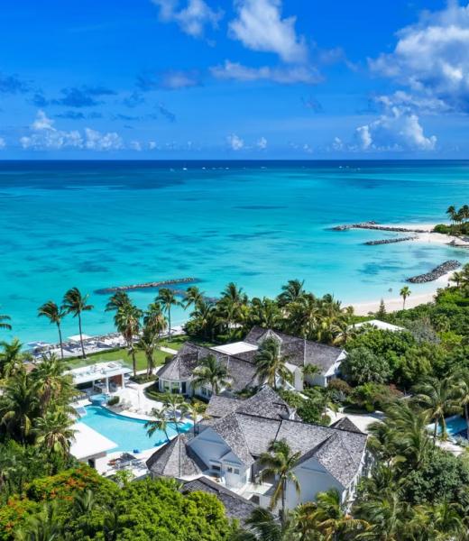 Salacia Villa is a breathtaking 9 bedroom waterfront property on Grace Bay Beach. The sprawling outdoor landscape incorporates an expansive deck with a vista overlooking the stunning turquoise waters - perfect for your Turks and Caicos vacation. There is outdoor dining, with pizza oven and grille along with a spectacular deck above where you can...