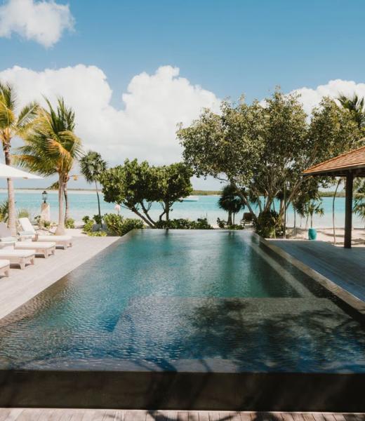Nestled within four acres of lush tropical landscaping and boasting 600 feet of Grace Bay beach frontage, The Catch is an exquisite Turks and Caicos villa island retreat exuding Caribbean charm. Recently revitalized with a multi-million-dollar refurbishment, this private residence offers an exclusive opportunity to experience the blend of...
